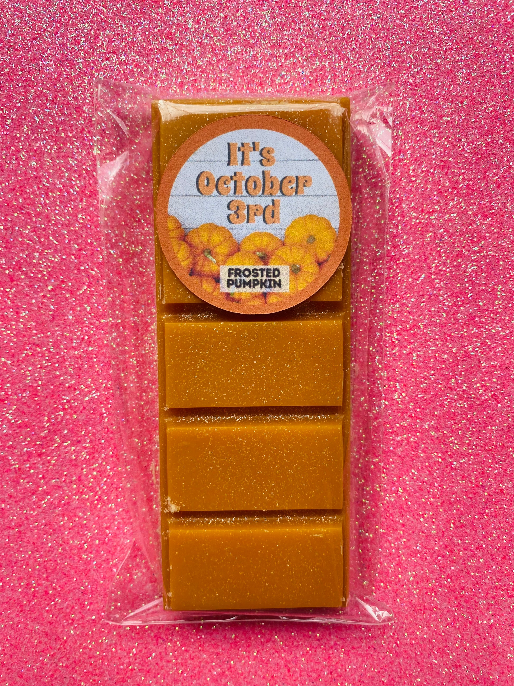 wax melts inspired by the Mean Girls movie, each with different colors and labels corresponding to different quotes from the film.